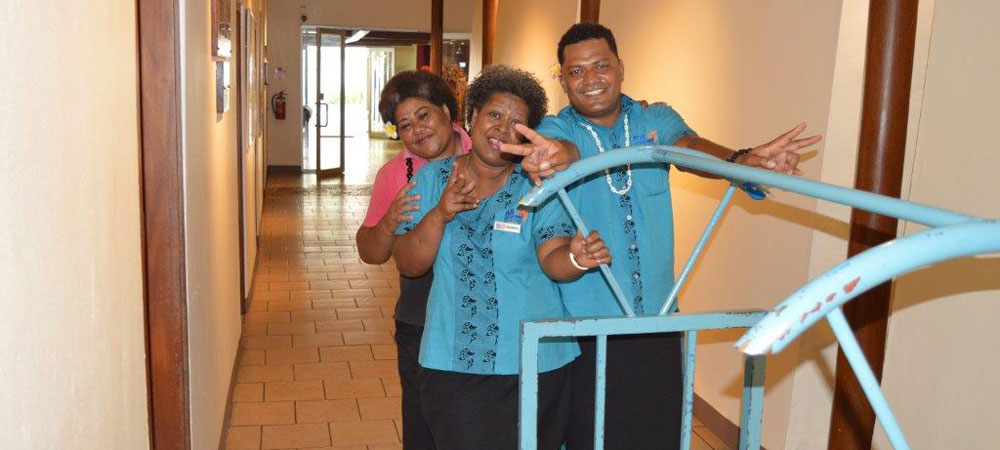 Resort staff at the Fiji Hideaway Resort's beach.