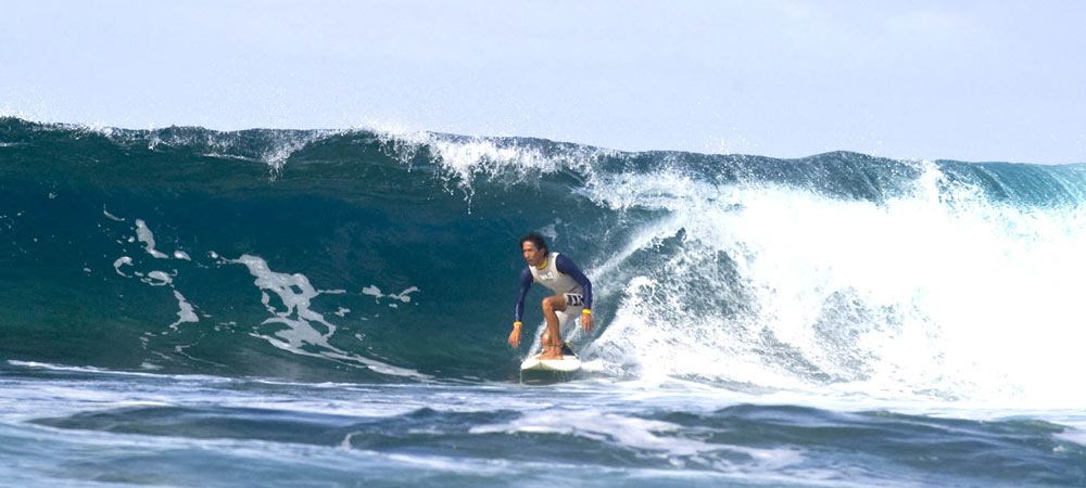 Surfing off the Fiji Hideaway Resort's beach.