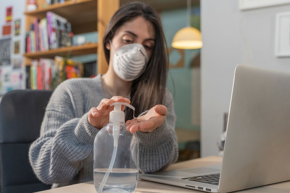 COVID safety with hand sanitiser, and mask