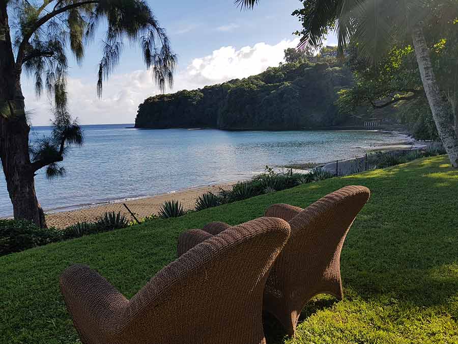 Outdoor furniture on the garden outside of the Tahiti Pearl Beach Resort