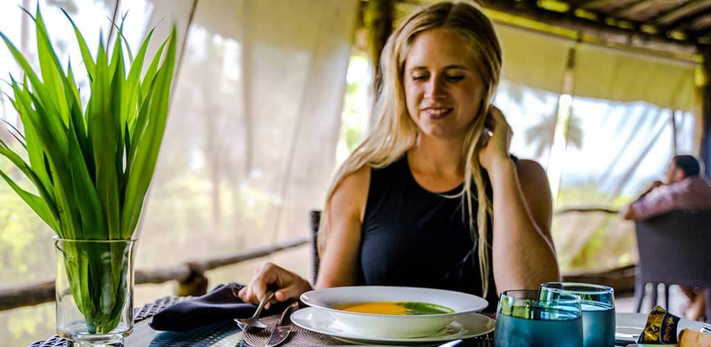 Woman dining at Qamea Fiji