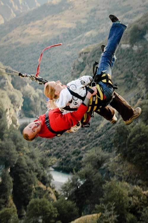'Canyon swinging' over the Shotover River.