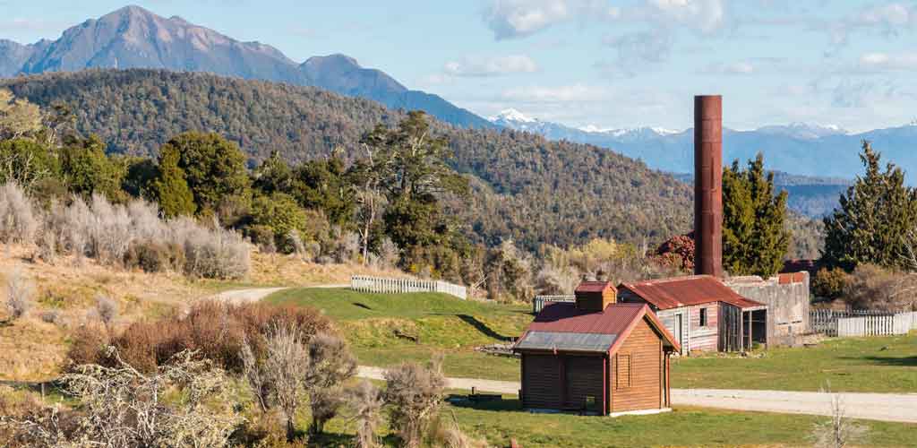 Hiking past the old Waiuta gold mine in New Zealand.