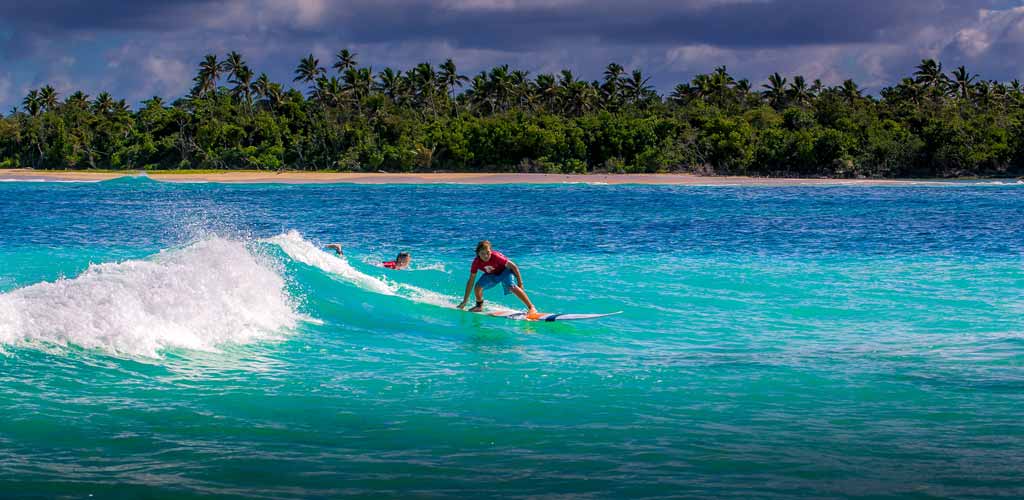 Surfing on Tongan breaks.