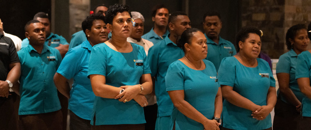 The resort's staff performs a traditional Fijian farewell song.