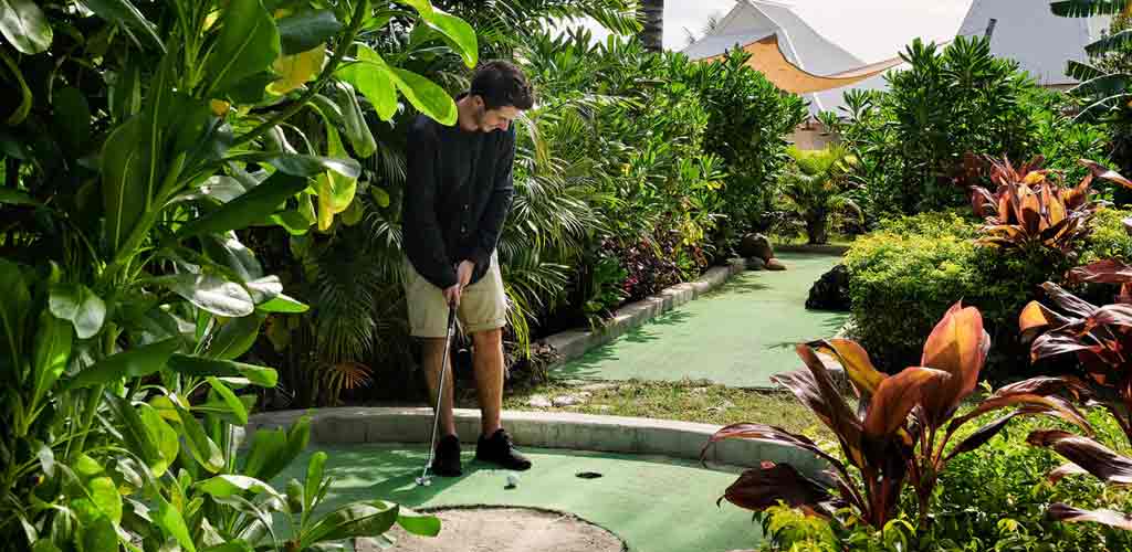 Playing golf at Sheraton Resort & Spa Tokoriki Island