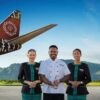 Fiji Airways plane fuselage and staff